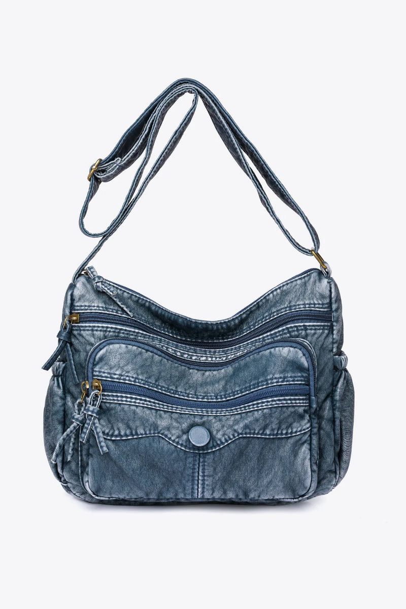 How do I style a crossbody bag with different outfits?