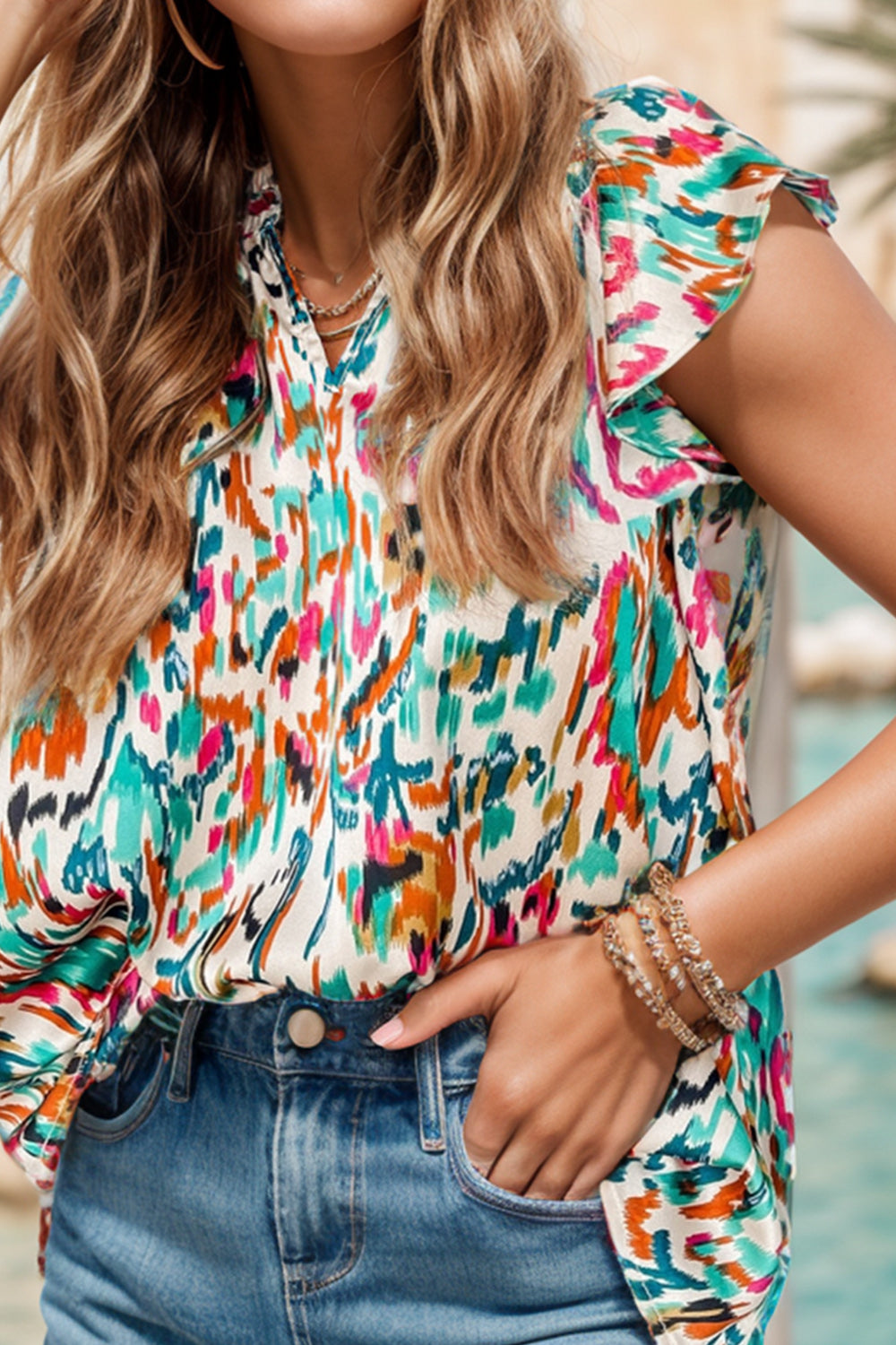 Ruffled Printed Notched Cap Sleeve Blouse
