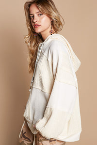 Exposed Seam Hooded Knit Top