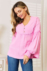 Exposed Seam Buttoned Notched Neck Blouse