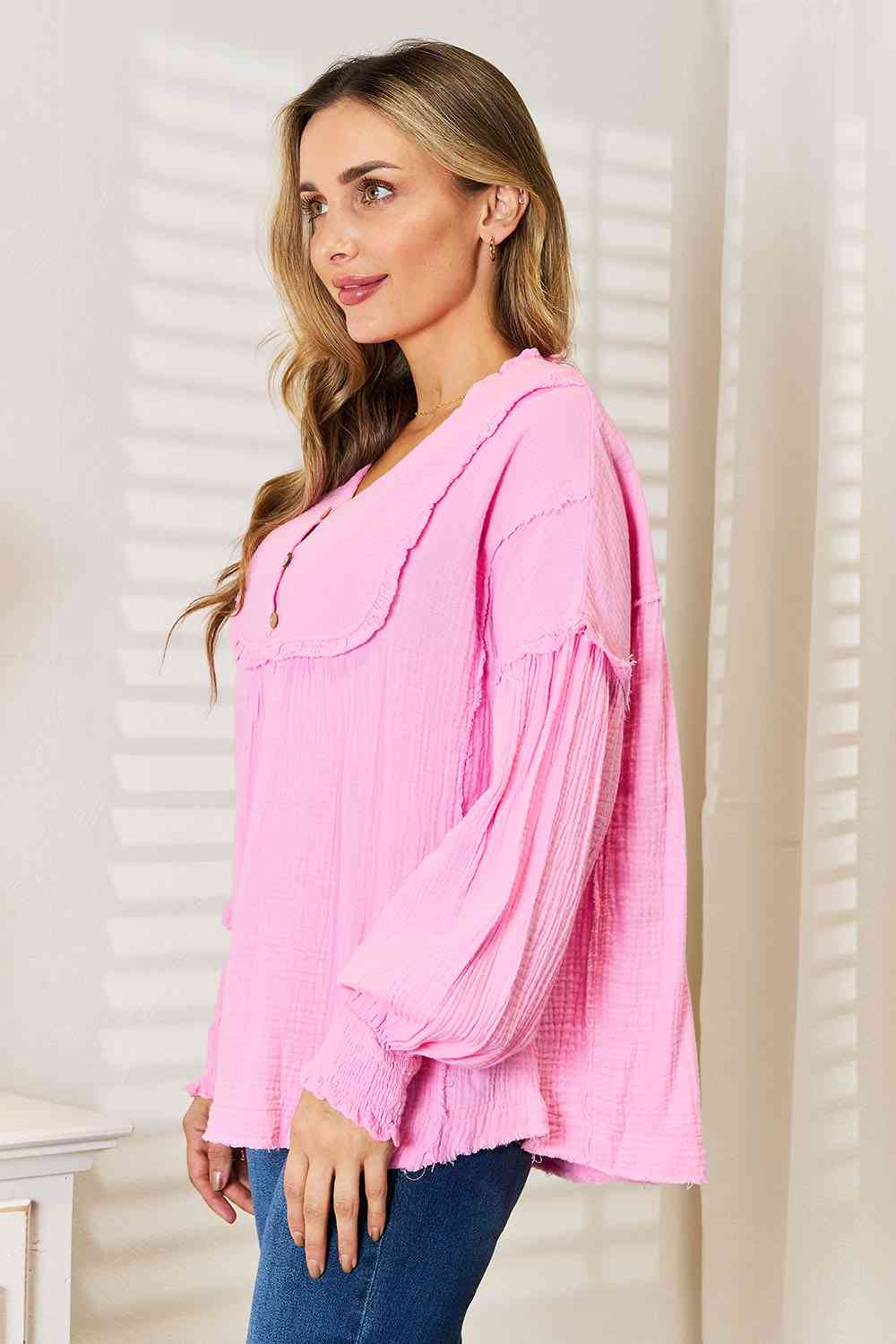 Exposed Seam Buttoned Notched Neck Blouse